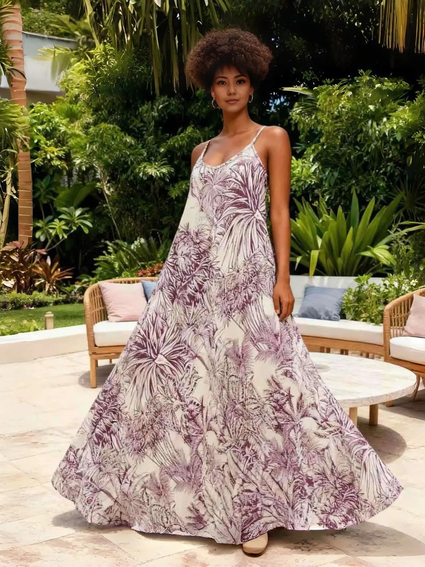 White and mauve tropical print maxi dress with spaghetti straps, flowy hem
