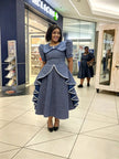 Blue patterned midi dress with layered puff sleeves and tiered flounce hem
