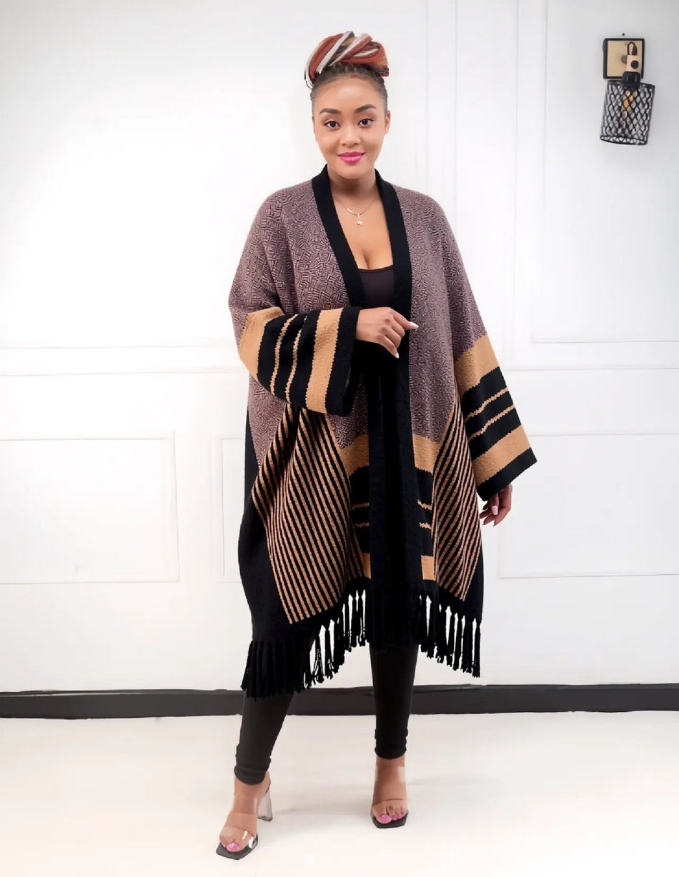 Striped knit cardigan poncho with fringe trim, open front, black and brown bands