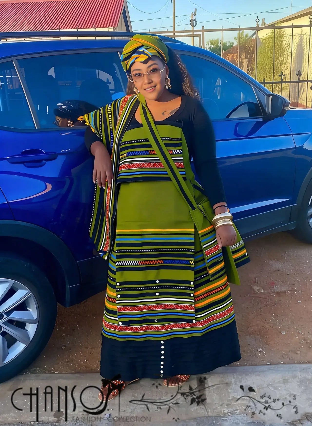 Geometric maxi skirt set with green-striped tunic and black skirt, multicolor bands