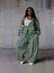 Green zip-front hoodie and wide-leg sweatpants loungewear set