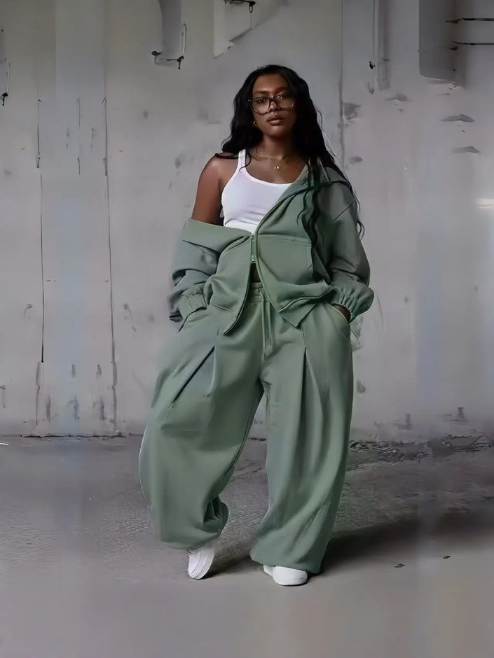 Green zip-front hoodie and wide-leg sweatpants loungewear set