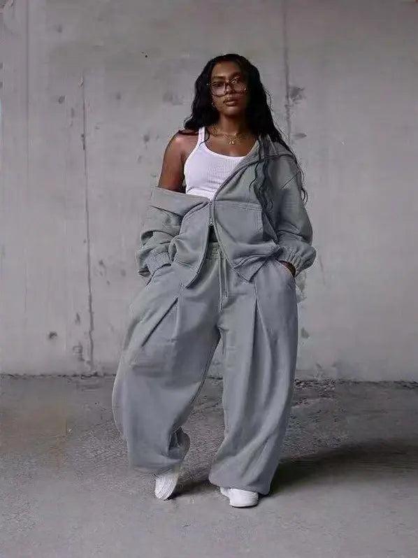 Grey zip-front hoodie and wide-leg sweatpants loungewear set