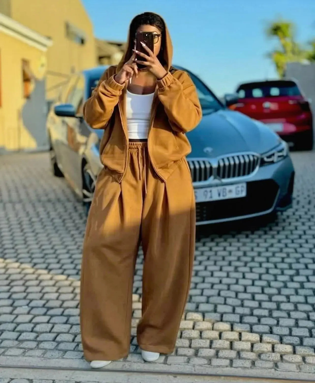 Brown zip-front hoodie and wide-leg sweatpants loungewear set