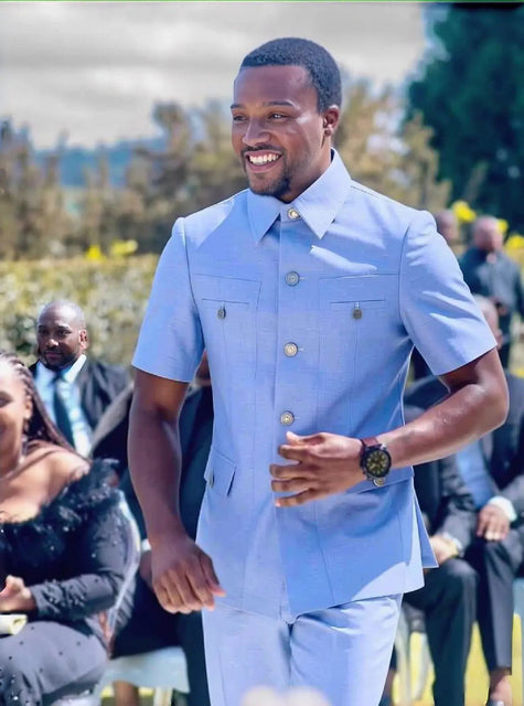 Light blue short-sleeve two-piece suit with button front and chest pockets