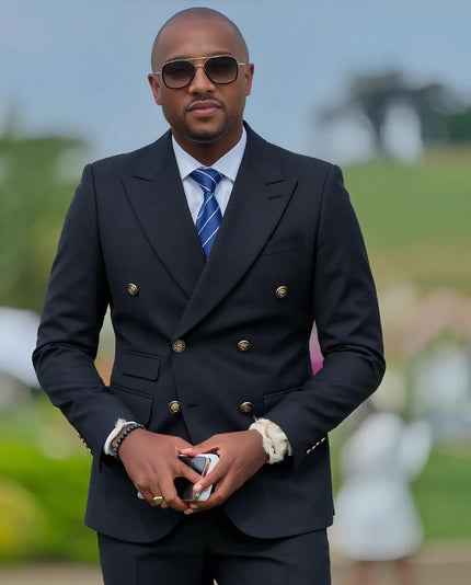 Men's black double-breasted suit with gold buttons and matching trousers
