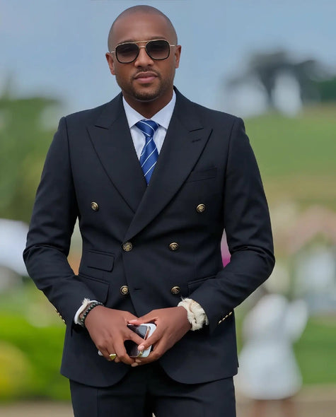 Men's black double-breasted suit with gold buttons and matching trousers