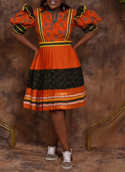 Orange puff-sleeve midi dress with V-neck, multicolor trim, black polka-dot skirt