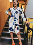 Abstract shirt dress with white and blue paint-style print, long sleeves, button front.