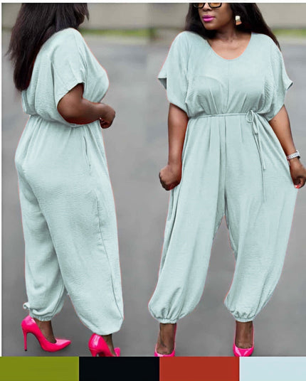 Pale turquoise cinched-waist jumpsuit with drawstring and wide ankle-cuff legs