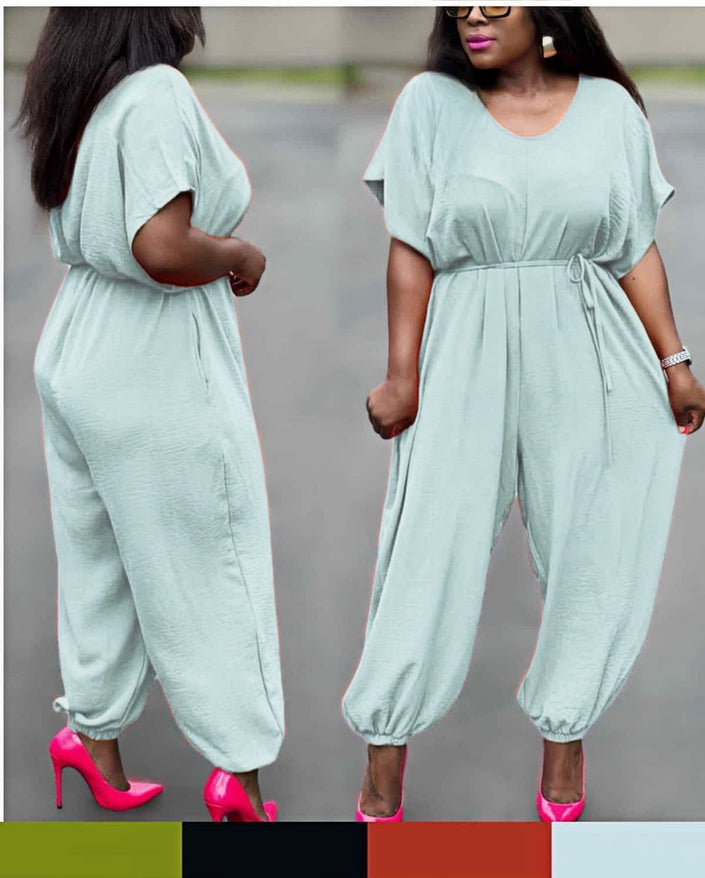 Pale turquoise cinched-waist jumpsuit with drawstring and wide ankle-cuff legs