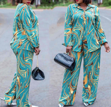 Swirl printed wide-leg trousers set in teal with gold swirl pattern