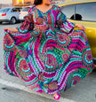 Multicolor puff-sleeve maxi dress with V-neck and geometric swirl pattern