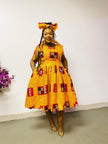Yellow midi dress with geometric African print, short sleeves, flared skirt