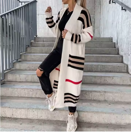 Striped knit long cardigan with open front, cream and black bands, red accents