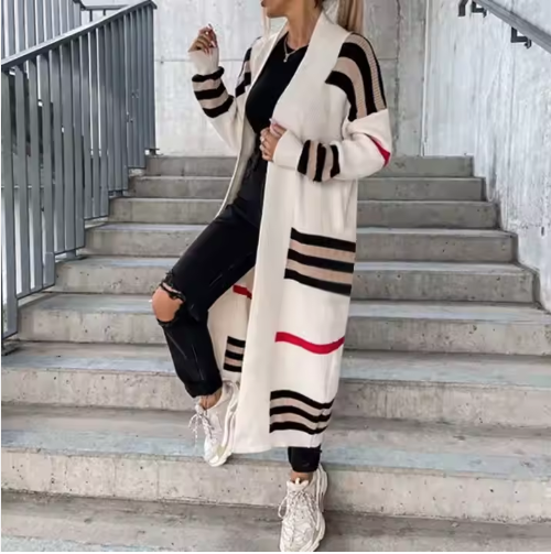 Striped knit long cardigan with open front, cream and black bands, red accents