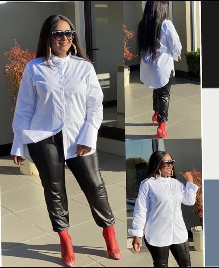 White long-sleeve button-up shirt with classic collar and extended cuffs