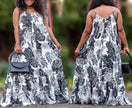 Black-and-white floral maxi dress with spaghetti straps, square neckline, tiered skirt