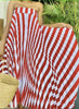 Red and white wave-pattern off-shoulder pleated midi dress