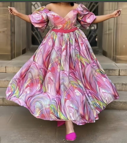 Pink maxi dress with puff sleeves, multicolor abstract print, cinched waist