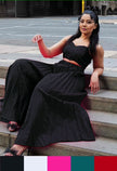 Black square-neck sleeveless top and pleated midi skirt set