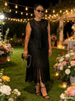 Black geometric twin set layered dress with circular sequin pattern and ruffled shoulders