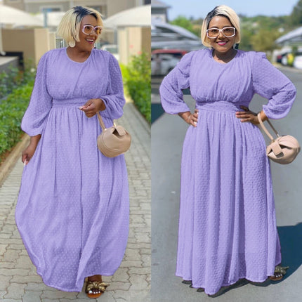 Light-purple maxi dress with cinched waist and puff sleeves, subtle dotted texture