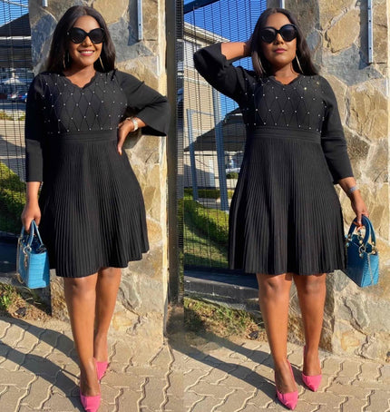 Black knit pleated V-neck long-sleeve dress with diamond rib detail