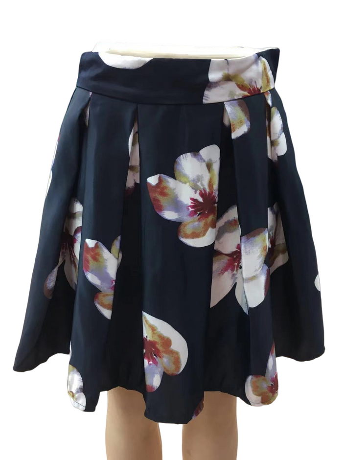 Pleated A-line floral skirt, dark base with large white and red flowers, full skirt