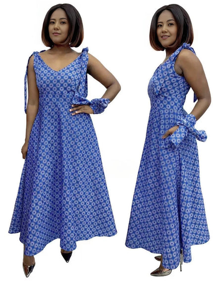 Blue patterned A-line V-neck dress with sleeveless adjustable straps and tied waist