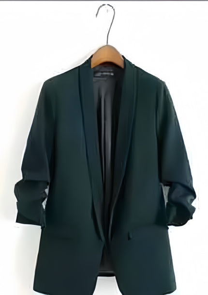 Dark green blazer jacket on hanger with notched lapels and patch pockets.