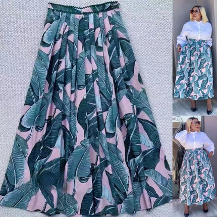 High-waist flowy tropical leaf skirt with teal and pink leaf print, elastic waistband