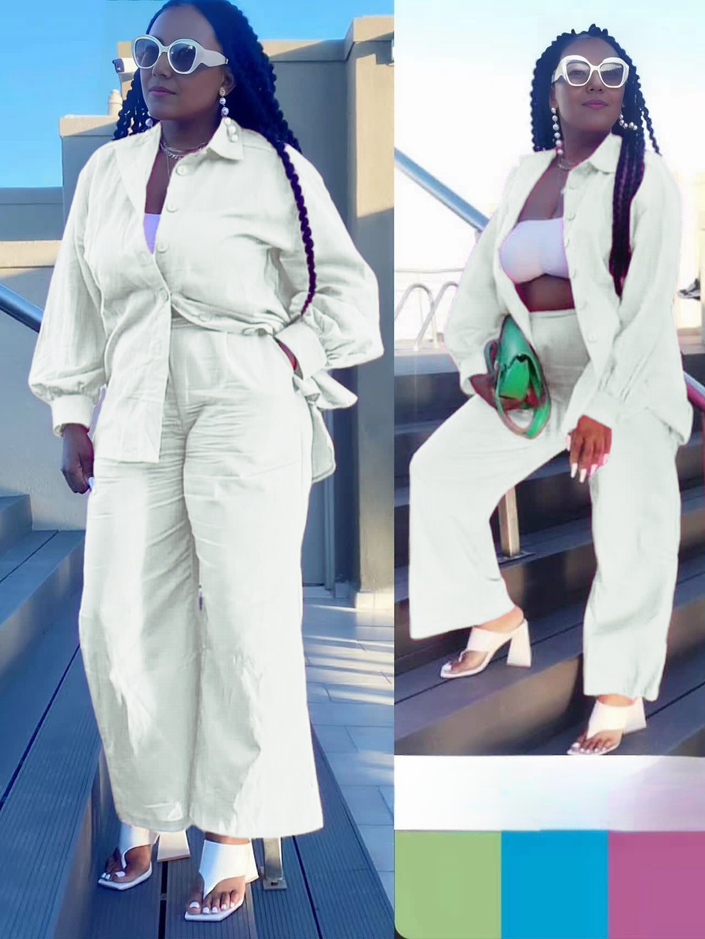 White loose shirt and straight pant twin set with button front and tie waist