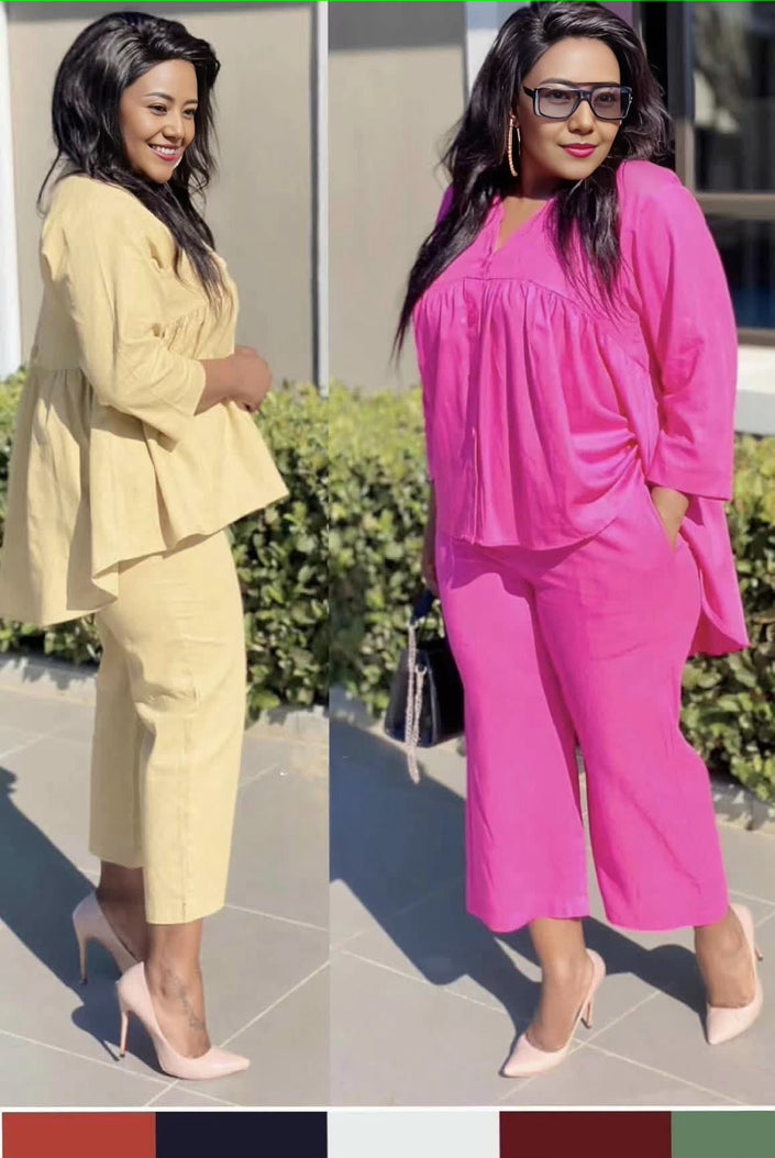 Light-yellow cropped trousers with front pleats, relaxed comfort fit