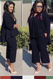 Black cropped trousers with front pleats, relaxed comfort fit