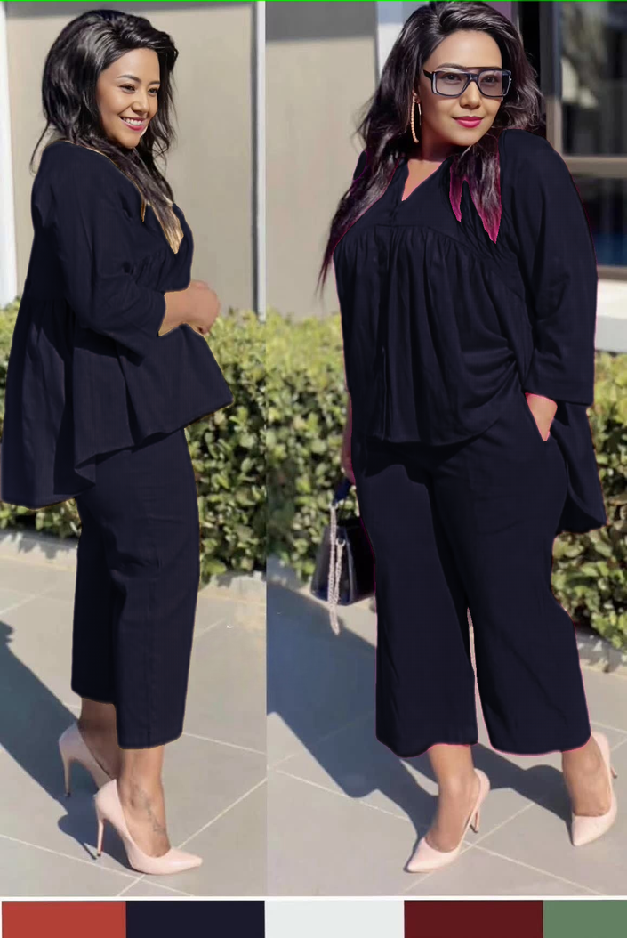 Black cropped trousers with front pleats, relaxed comfort fit