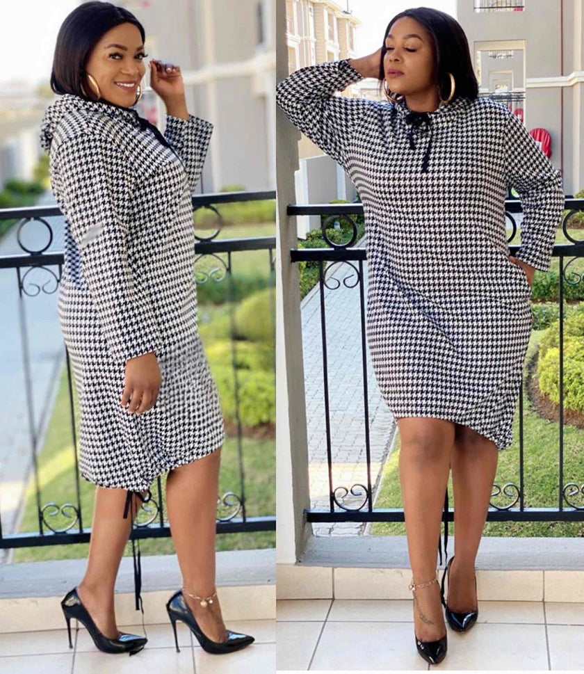 Houndstooth midi dress with tie neck, long sleeves and black-and-white pattern