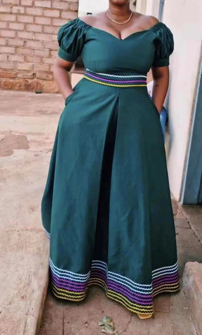 Dark-cyan puff-sleeve traditional dress, square neckline, striped hem and waist belt