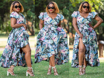 Floral ruffle maxi dress with flutter sleeves, V-neck, and side slit, blue pink green print