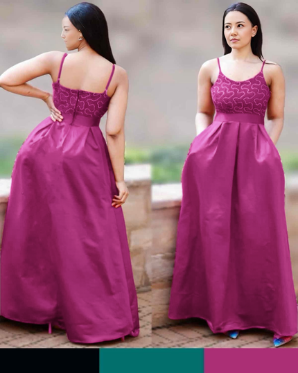 Fuchsia maxi dress with spaghetti straps, patterned bodice, and full gathered skirt