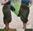 Olive green midi skirt with adjustable side drawstring, gathered waist, and front pockets