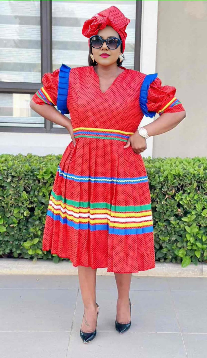 Traditional Puff-Sleeve Dress with Belted Waist and Horizontal Stripe Skirt Design