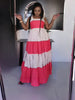 Layered two-tone dress with red and white tiered skirt, sleeveless bodice