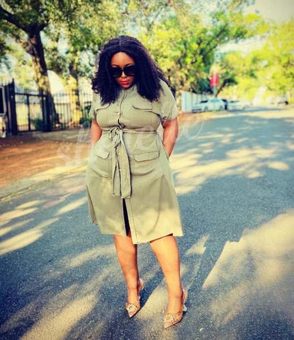 Olive shirt dress with tie waist, chest patch pockets, short sleeves, midi length