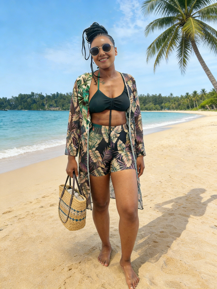 Swimsuit set with dark bikini top and high-waist bottoms, tropical leaf print cover-up