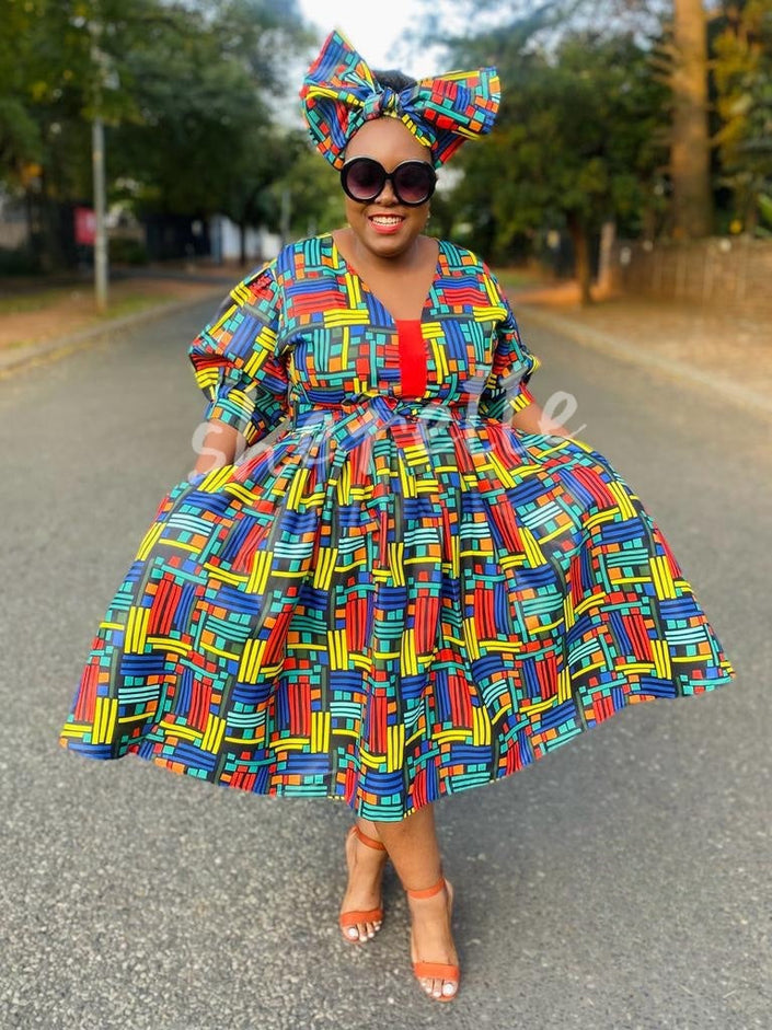 Geometric print puff-sleeve dress with full skirt and V-neck bodice