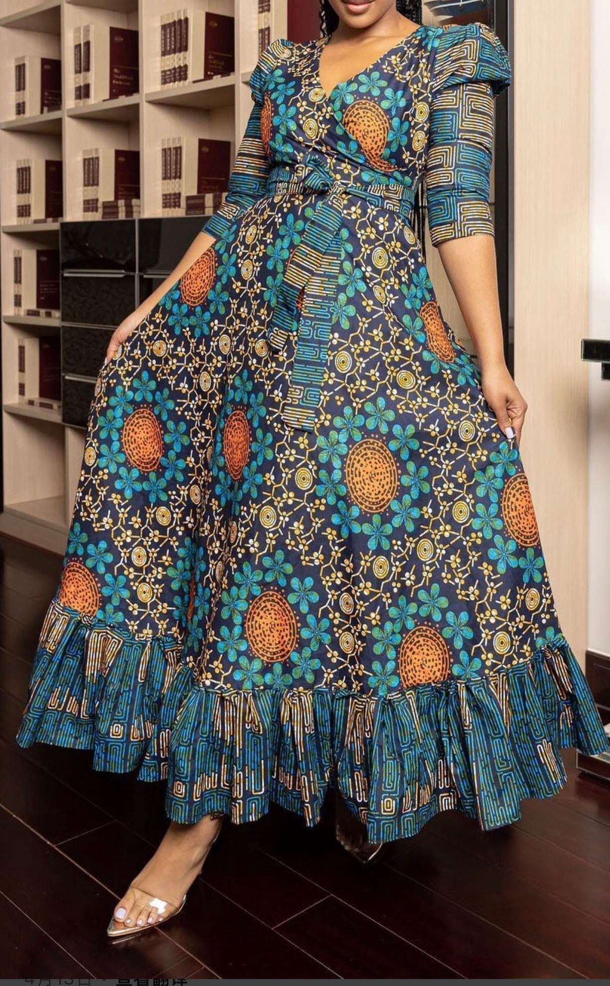 V-neck maxi dress with ruffle hem, teal and navy African print with gold accents