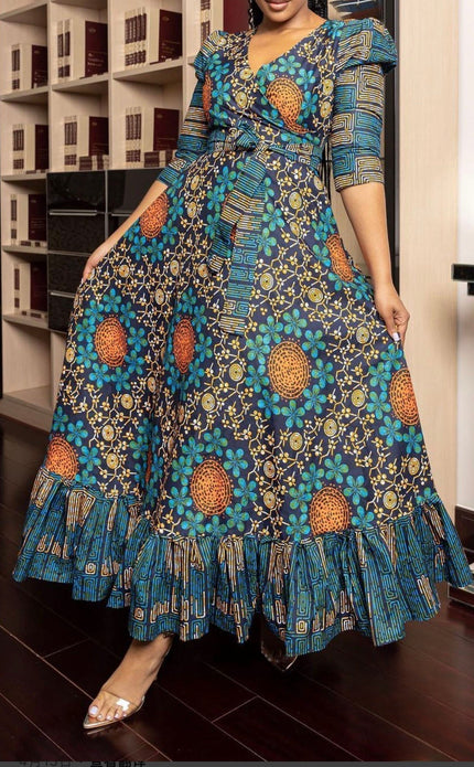 V-neck maxi dress with ruffle hem, teal and navy African print with gold accents