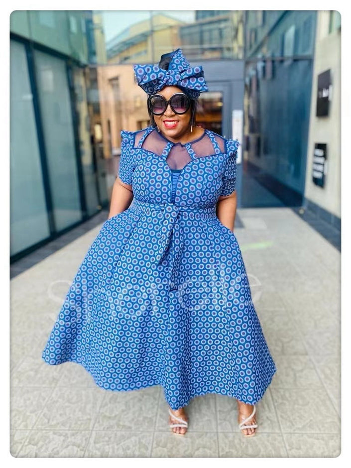Turquoise-blue patterned midi dress set with off-shoulder neckline and bow headwrap