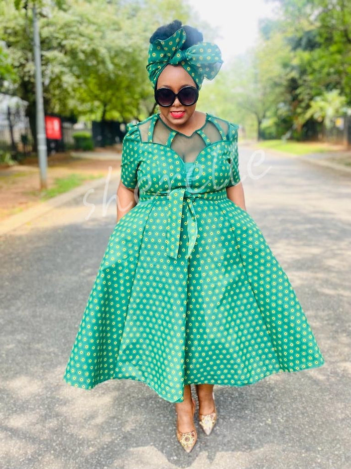 Green patterned midi dress set with tie waist and matching bow headwrap